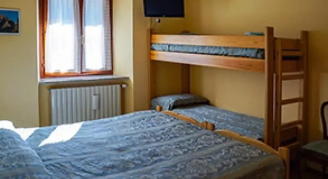 Четырёхместный номер Classic с красивым видом из окна Albergo Ristorante Sole