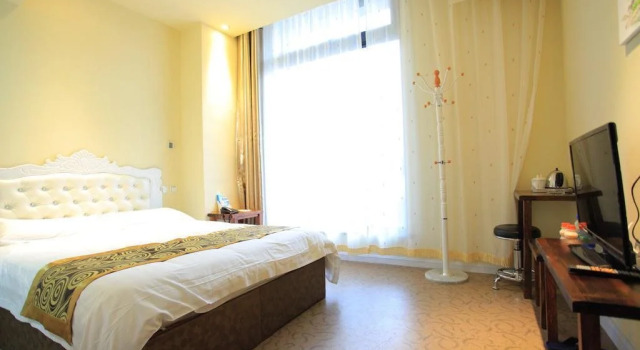 Qingdao Mei'er Xidun Theme Hotel
