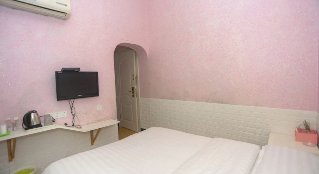 Standardowy dwuosobowy pokój AiShang Hostel