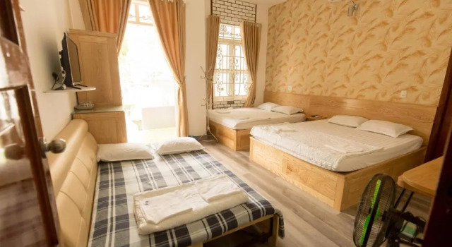 Кровать в общем номере Thuan Hoa Hotel