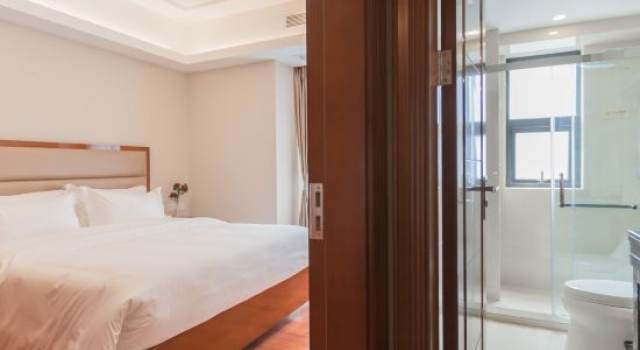 Четырёхместный люкс Deluxe с 2 комнатами Ming Xuan Hotel