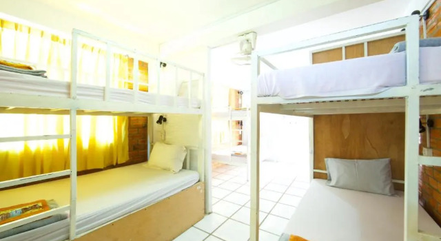 Кровать в общем номере Naga Angkor Hostel