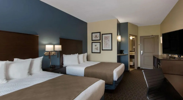 Четырёхместный номер Classic AmericInn by Wyndham Sioux Falls North