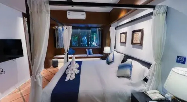 Семейный люкс Xishuangbanna Jinghong Wanji Lijing Hotel