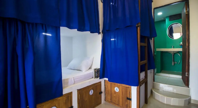 Кровать в общем номере Casa del Puerto Hostel & Suites