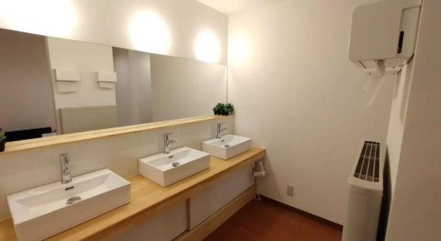 Кровать в общем номере Keimichi Guest House