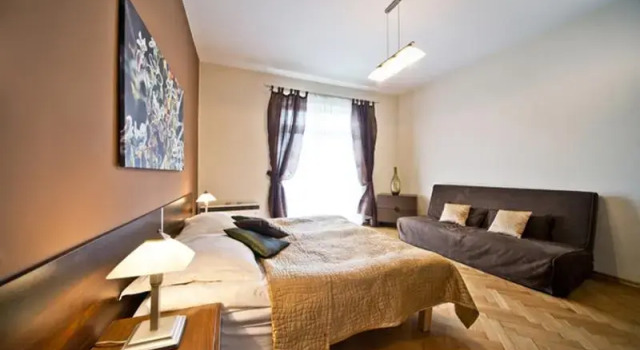 Кровать в общем номере с 2 комнатами с балконом 4Seasons﻿ Apartments Cracow