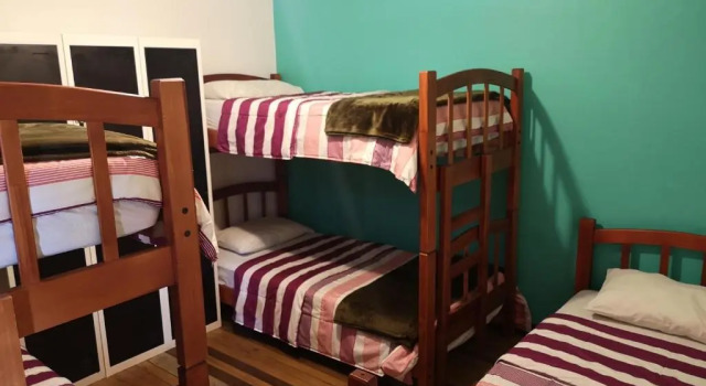 Кровать в общем номере Hostal Vitalia