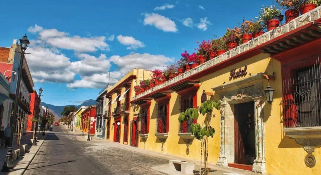 Кровать в общем номере Hotel Oaxaca Real