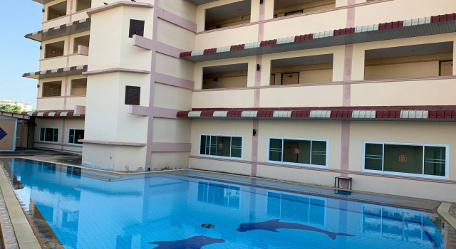 Кровать в общем номере AA Pattaya Ville