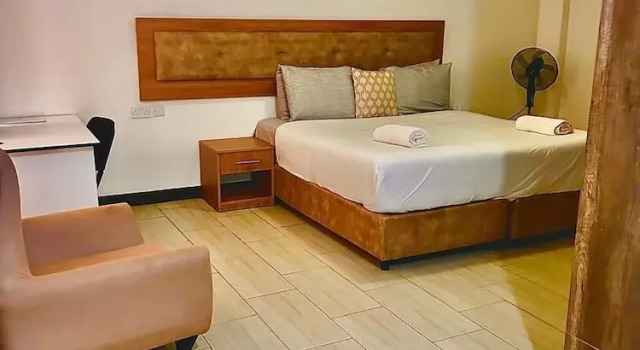 Komfortowy pokój Kilimani Suites