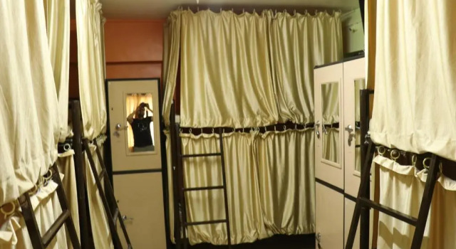 Кровать в общем номере Ashirwad Guest House