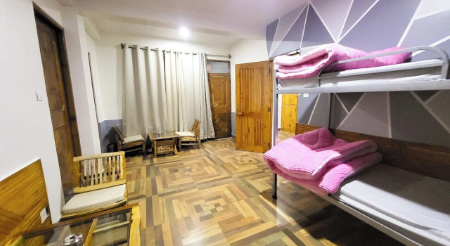 Кровать в общем номере Luvya Retreats Hotel