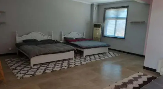 Кровать в общем номере Caidouxuan Farmhouse