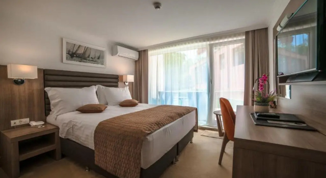 O podwyższonym standardzie pokój Hotel Saturn