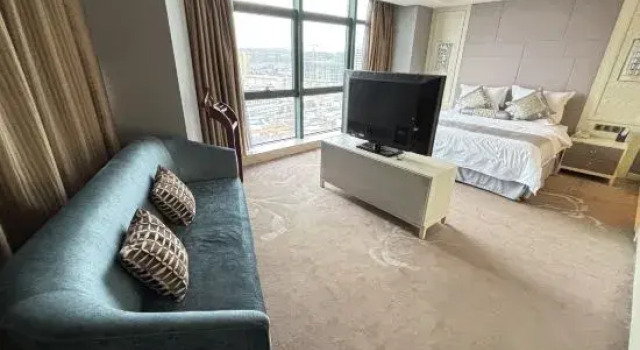 Люкс Executive Huancheng Caston Hotel
