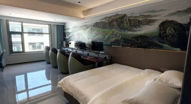 Кровать в общем номере Tianyuan Hotel (Uxin Banner Cultural and Sports Center)