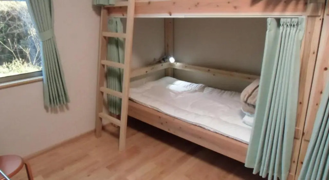 Кровать в общем номере (женский номер) Guest House Yakushima