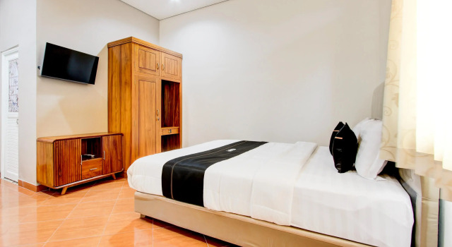 Номер Deluxe Capital O 93994 Dalem Kamulyan Syariah Guest House