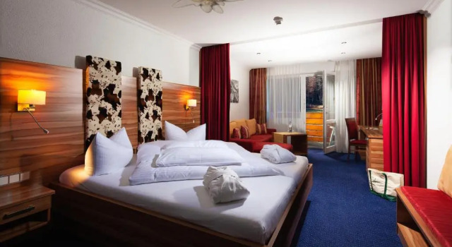 Номер Deluxe Alm- & Wellnesshotel Alpenhof
