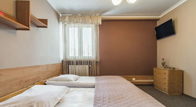 Номер Classic с 2 комнатами с видом на сад Guest Rooms and Family Apartments