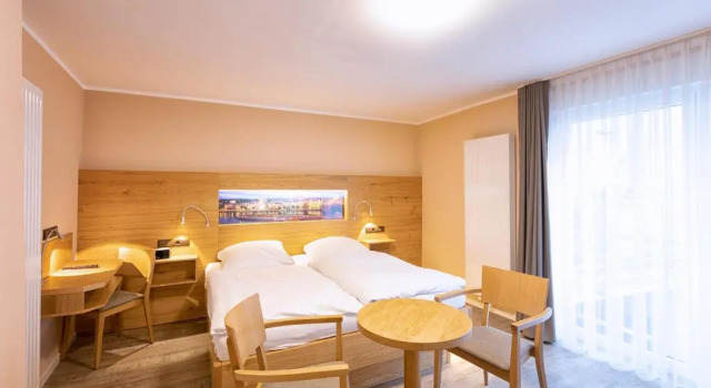 Четырёхместный номер Comfort Hotel-Restaurant Weinhaus Grebel
