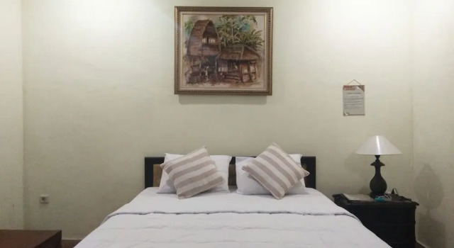 Двухместный номер Deluxe с балконом и с видом на сад Puri Alam Dewata - Guest Villas