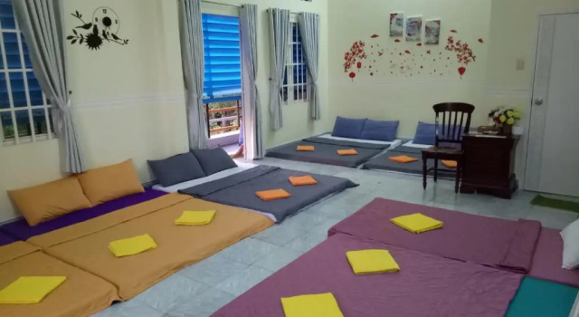 Кровать в общем номере Binh An Backpacker Guesthouse