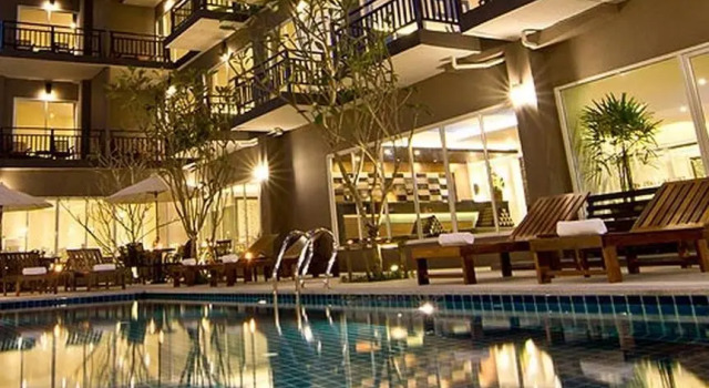 Кровать в общем номере Balitaya Naklua Hotel