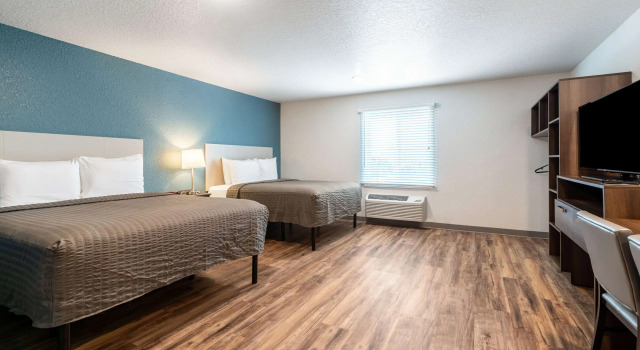 Четырёхместный номер Standard WoodSpring Suites Sanford North I-4 Orlando Area