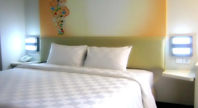 Negócio quarto Cordela Hotel Cirebon