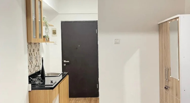 Студия Comfy Studio Apartment at Grand Asia Afrika By Travelio