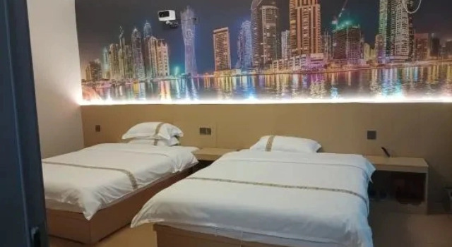 Шестиместный семейный люкс с 2 комнатами Minghao Homestay