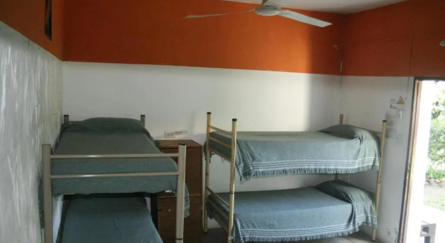 Кровать в общем номере Andamundos Hostel