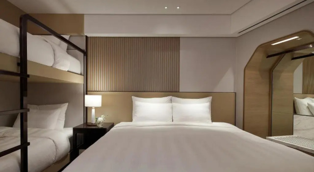 Трёхместный семейный полулюкс номер Lotte Hotel World