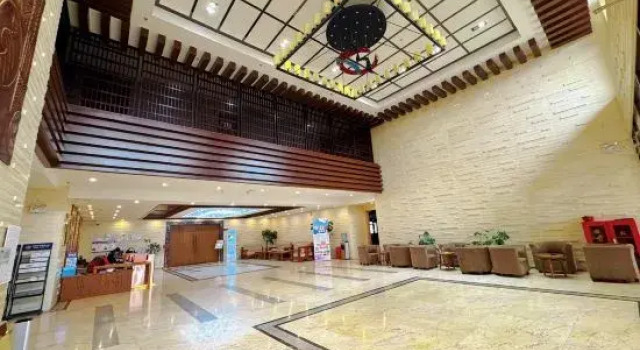 Changbai Mountain Pool West Wanda Yuehua loft Hotel, Rezerwuj Hotel Hotele 4-gwiazdkowe w Jilin, 4*