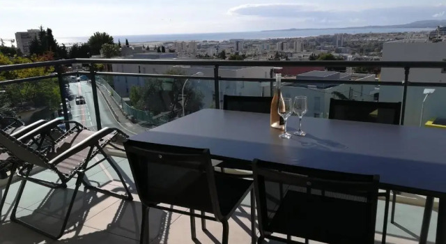 Апартаменты Greeter-Appartement avec vue mer, parking et piscine