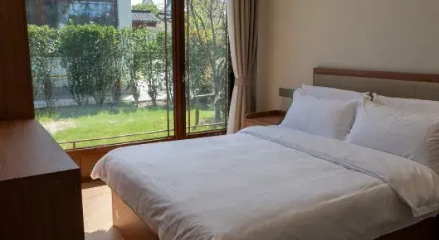 Семейный люкс с 2 комнатами Shuaiwa Club Homestay (Shanghai Jinshan North Station Huakai Seaside Ecological Park)