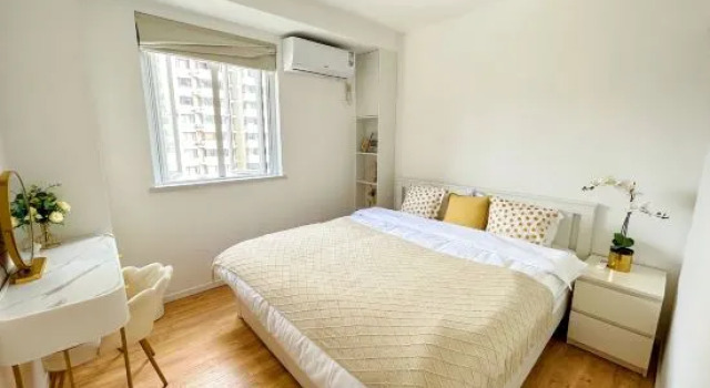 Кровать в общем номере Huasu Homestay (New International Expo Center)