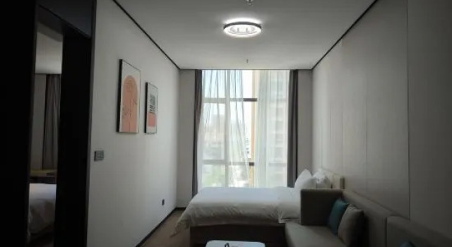 Трёхместный люкс Deluxe Ribo Boutique Hotel Linhai