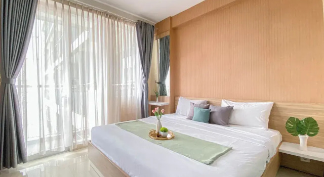 Апартаменты Standard Homey and Comfortable 1BR Apartment at Dago Suites