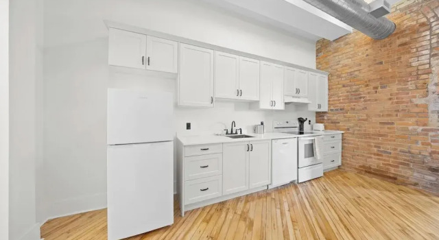 Номер Luxury Tri Century Mill Suites