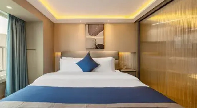 Люкс Мансарда с 3 комнатами JIANHAI Apartment (Near Zhuhai Gongbei Port & Zhuhai High-Speed Railway Station)