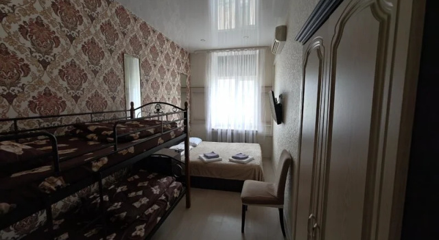 Cama en dormitorio compartido IQ Mini-hotel