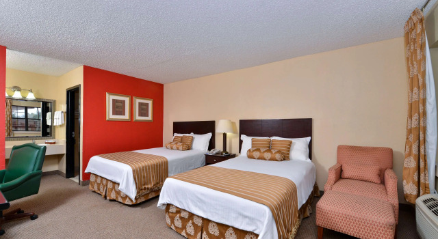 Четырёхместный номер Deluxe Americas Best Value Inn and Suites Victoria