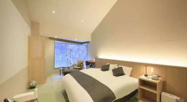 Кровать в общем номере Ryokan Tanigawa