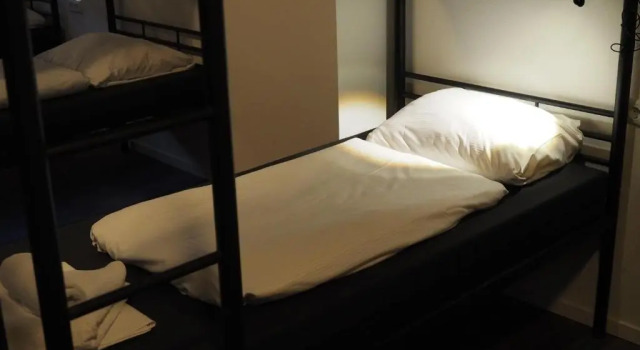 Кровать в общем номере Hotel t Anker