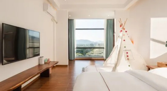 Семейный тент с красивым видом из окна Guangzhou Yuxi Guli Garden Boutique Homestay