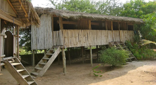 Кровать в общем номере Barbara's Village
