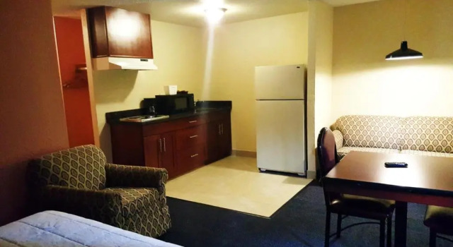 Люкс Deluxe Sutton Suites Hotel